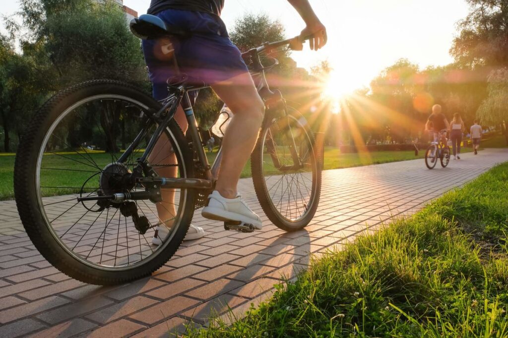 Man enjoying outdoor cycling on a sunny day
