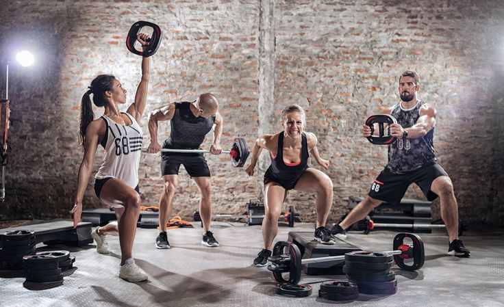 Man performing weightlifting during gym training session