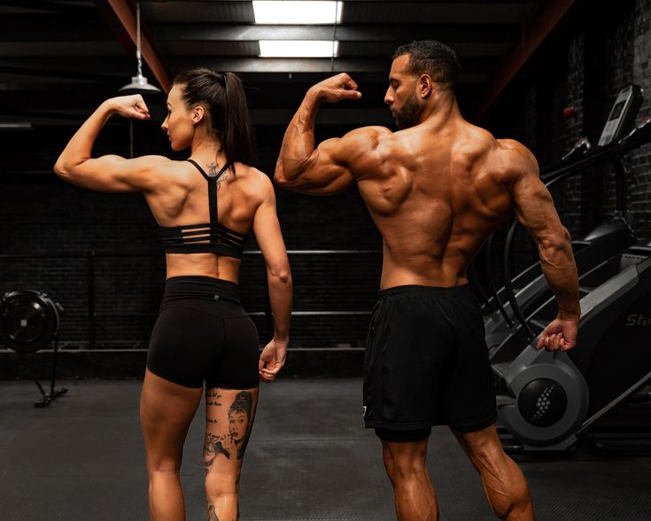 Group of athletes doing strength exercises as part of gym training