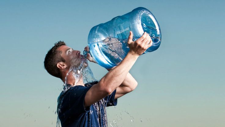 Man drinking safe drinking water to stay hydrated and healthy